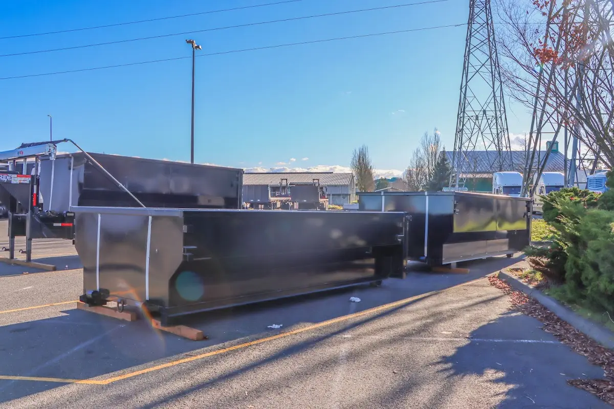 Roll-off dumpster ready for waste disposal at job site for 3 Yard Dumpster Rental in Hebron
